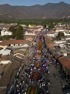 an aerial view of a city with lots of people