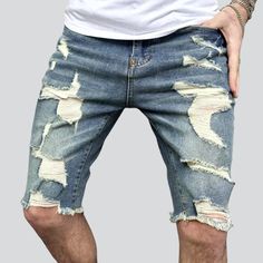 Introducing the 2023 Summer Collection the perfect combination of mode and comfort! Our vintage fitted distressed denim shorts are the epitome of grunge; with a mid-waist fit. zipper and button closure. and torn detailing. these shorts are sure to be at the top of your vogue list.Why These Shorts Should Be Your Next PurchaseFashion-forward and stylish. these shorts capture the spirit of the season. The damaged detailing adds a touch of edge. making them the perfect addition to any wardrobe. Whet Ripped Cotton Knee-length Shorts, Distressed Jean Shorts For Streetwear, Ripped Denim Knee-length Jean Shorts, Ripped Shorts For Streetwear, Distressed Cotton Knee-length Jean Shorts, Knee-length Distressed Cotton Jean Shorts, Trendy Distressed Knee-length Jean Shorts, Men Summer Streetwear, Mens Jean Shorts