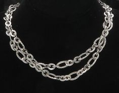 "925 Sterling Silver - Vintage Shiny Diamond Cut Oval Chain Necklace - NE2848  925 Sterling Silver - Vintage Shiny Diamond Cut Oval Chain Necklace - NE2848  Jewelry Type:         Necklace   Metal Type:            925 Silver  Metal Size:             50\" Length  .50\" Height   Stone Type:            N/A  Condition:              N/A  Jewelry Weight:     95.1 Grams  PLEASE NOTE: THIS ITEM IS PRE-OWNED. ALTHOUGH MOST ITEMS ARE IN VERY GOOD CONDITION, SOME MAY NEED CLEANING AND/OR MINOR REPAIRS. WE M Silver Oval Chain Necklace, Silver Oval Link Jewelry With Double Chain, Silver Oval Chain Necklace For Formal Occasions, Silver Oval Link Metal Necklace, Silver Oxidized Chain Link Necklace, Vintage Silver Tarnish-resistant Necklaces, Vintage Multi-strand Silver Chain Necklace, Gunmetal Silver-plated Chain Link Necklace, Clear Pictures