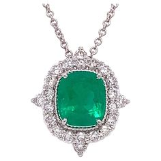 18K White Gold Emerald: 1.82ct total weight Diamond: 0.69ct total weight All diamonds are G-H/ SI stones. Chain Length: 16in to 18in White Gold Pendant Necklace, White Gold Chain, White Gold Pendant, Emerald Pendant, Green Emerald, Emerald Diamond, Brilliant Diamond, Gold Pendant Necklace, Pendant Set