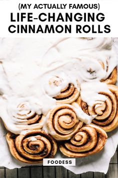 cinnamon rolls with icing on top and the words, my actually famous life - changing cinnamon rolls