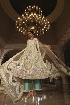 The departure of spring marks the cloudburst of delicate pastel-hued sequins and crystals sprinkling on Biscotti flared Tunic in Kashmiri embroidery accompanied by tasselled drape and aqua teal silk palazzos, enticing the softness and tranquillity of a #Nooraniyat soiree Kashmiri Embroidery, Bird Cage Decor, Manish Malhotra, Bridal Lehenga Choli, Contemporary Chic, Manish, Pastel Hues, Bridal Lehenga, Lehenga Choli