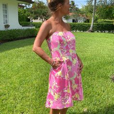 Lilly Pulitzer Blossom Dress-Size 12 Lined Strapless Pockets Each Side Of Dress-Front Box Pleat On Each Side Of Dress -Front& Back Zipper-Invisible-Center Back Measurements- Pit To Pit-19 1/2” Waist-17” 34-Total Hip Area-22”- Equals- 44-Totall Length-31” Pink Knee-length Strapless Dress For Summer, Pink Strapless Dress For Summer, Knee-length, Strapless Pink Sundress For Garden Party, Yellow Fitted Strapless Dress For Spring, Strapless Lined Dresses For Garden Party, Pink Fitted Strapless Sundress, Yellow Strapless Dress For Garden Party, Strapless Yellow Floral Print Dress, Strapless Yellow Floral Dress