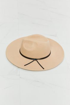 This hat is perfect for both casual and formal occasions. The soft beige color of the hat is versatile and complements a variety of outfits, while the black faux leather knot detailing adds a touch of elegance and sophistication. The adjustable straps ensure a comfortable and secure fit for any head size. The classic fedora style is timeless, and the addition of the faux leather knot detailing gives it a modern twist that sets it apart from other fedoras on the market. Type: Fedora Pattern type: Fedora Pattern, Soft Beige Color, Fedora Style, Blue Zones, Wide Brim Fedora, Soft Beige, Of Outfits, Affordable Jewelry, Brim Hat