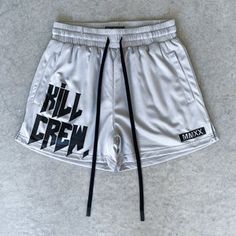 Kill Crew Shorts, Silver Stretch Bottoms Short Length, Gray Athletic Shorts For Streetwear, Silver Stretch Bottoms For Summer, Fitted Gray Summer Shorts, Casual Silver Bottoms For Streetwear, Fitted Silver Shorts For Summer, Gray Athletic Shorts For Summer, Silver Bottoms With Built-in Shorts