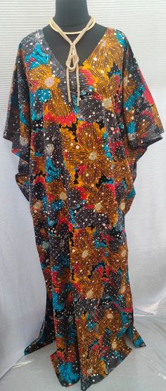 Luxury Handmade stoned ankara Kaftan Made with quality Ankara (100% cotton Ankara fabric) One size fits all (up to size 24) No linning Opening on both sides of the dress Fully stoned Deep v neck Traditional Multicolor Ankara Kaftan, Traditional Multicolor Ankara Fabric Kaftan, Multicolor Bohemian Kaftan In Ankara Fabric, Bohemian Multicolor Ankara Maxi Dress, African Long Dress, Ankara Kimono Jacket, Ankara Kaftan, Ankara Kimono, Silk Kaftan