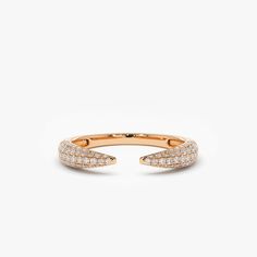 a gold ring with two rows of diamonds