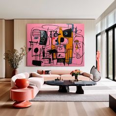 a living room filled with furniture and a painting on the wall