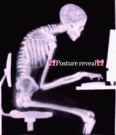 an x - ray image of a skeleton sitting at a desk using a computer keyboard