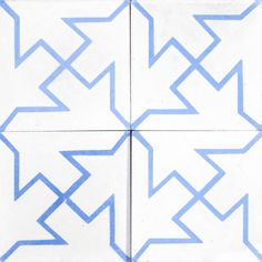 four tiles with blue lines on them in the shape of an interlocked star