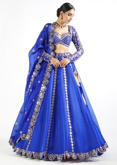 Real hand cut mirror embroidered sweetheart neck blouse with satin organza real hand cut mirror border skirt and dupatta. Gown Blue Royal, Simple Lengha Design, Royal Blue Lengha, Shimmer Lehenga, Sweetheart Neck Blouse, Royal Blue Lehenga, Indian Royalty, Vani Vats, Mirror Border