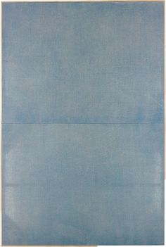 an abstract painting with blue and white lines on the bottom half of it, in front of a light blue background