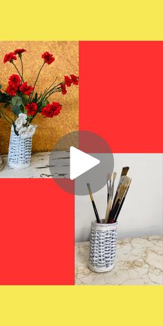 a vase filled with red flowers sitting on top of a table next to a wall