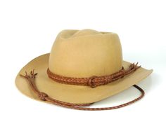 "(Whiskey cowboy hat band, cowboy like me, western leather hat band,  custom hat bands women,  leather hat bands, leather chin strap, leather stampede string, cowboy hat gift b) You Can Highlight Your Hat And Style Hat bands are one of the best fashion accessories that will help you complete your outfit. When you include an eye-catching hat band on your hat, you will make yourself much more attractive as the hats will help you enhance your appearance too. They are best for any type of cowboy hat- mainly with a stampede string.  📦 You will receive 📦 A Custome made leather cowboy hat band &  hand-braided leather stampede string- like in the pictures Eco-friendly product. Details: Material: High-quality Italian calfskin. Color: Saddle tan  Braid: 8-strand Size: It is adjustable between - Am Leather Hat Bands, Leather Friendship Bracelet, Cowboy Hat Band, Cowboy Like Me, Cowboy Hut, Cowboy Hat Bands, Leather Cowboy Hats, Black Cowboy Hat, Hat Bands