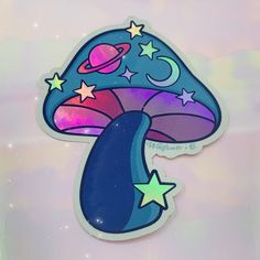 a blue mushroom with stars and planets on it's side, against a pastel background