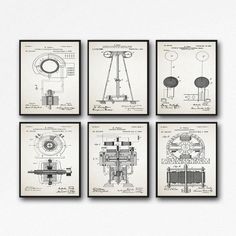 four blueprints of different types of machines on a white wall with black frame