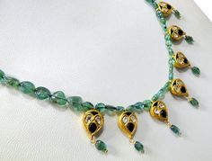 "vintage 22 k gold ,Emerald and Diamond polki pendant necklace. Length-47 cm(18.5\") we can adjust length, width of pendant-2 cm, weight-20.190 grams. Material-22 K gold, Emerald & Diamond polki." Kundan Emerald Necklace As Gift, Gift Kundan Emerald Necklace, Kundan Emerald Gemstone Necklace As A Gift, Gift Emerald Kundan Necklace, Festival Green Kundan Necklace In 22k Gold, Emerald Kundan Necklace For Gifting, Festival Kundan Emerald Necklace, Emerald Gemstone Kundan Necklace As A Gift, Emerald Gemstone Kundan Necklace For Gift