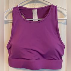 Nwt Fabletics Trinity High Impact Sports Bra Size S /6 Color: Bright Fig / Multi I Love These For Running With My Phone Stock Photo Shown For Fit Only Product Description We Turned Our Best-Selling Trinity Pocket Legging Into An Oh-So-Cute Bra For The First Time Ever! Naturally, We Crafted This High-Impact Style With The Same Innovative Triple-Pocket Designso You Can Keep Essentials Handy At Your Next Workout. Features Moisture-Wicking Breathable 4-Way Stretch Removable Bra Cups Pockets Fabric K Purple Sleeveless Sports Bra For Yoga, Purple Fitted Activewear For Light Exercise, Fitted Purple Activewear For Light Exercise, Purple Sleeveless Activewear For Training, Purple Activewear With Built-in Bra For Light Exercise, Purple Sleeveless Moisture-wicking Activewear, Purple Breathable Activewear For Training, Functional Purple Activewear For Light Exercise, Purple Sleeveless Activewear For Gym