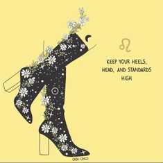 a woman's high heeled shoe with flowers on it and the words keep your heels, head, and standards high