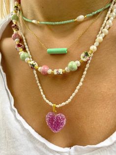 Four different handmade summer necklaces with different beads and charms but similar philosophy. The first necklace has some tiny beads in lyght green color, the second one is a dainty necklace with a light green bar from ceramic that is passsed through a gold chain, the third one is a really special neckalce with colorful ceramic beads and pearls. The last necklace is a pearls beaded necklace Combine them all together or wear them separetely as well. In Christina Christi Jewels store you can se Green Bohemian Necklace With Pearl Charm, Green Necklaces With Pearl Charm And Round Beads, Bohemian Green Necklace With Pearl Charm, Pastel Beaded Necklaces With Colorful Beads For Gifts, Pastel Beaded Necklaces With Colorful Beads As Gift, Pastel Colorful Beads Necklace For Gift, Handmade Charm Necklaces With Round Beads For Everyday, Everyday Green Round Bead Necklaces, Pastel Beaded Necklaces As Gift