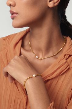 This stunning Aurora golden pearl beaded bracelet radiates elegance with its gorgeous golden sheen and luxe pearl. Divinely designed to be waterproof and tarnish proof, it's a must-have accessory for any wardrobe! Perfect for making a statement, this gold-plated masterpiece is sure to turn heads. ………………………………….D E T A I L S• Materials: Stainless steel, 18k gold plating, freshwater pearl.• Length: 17cm (6.7 inches) + extender 5cm (2 inches)• Width: 0.3cm (0.1 inch)• This product is hypoallergenic Contemporary Fine Jewelry, Pearl Beaded Bracelet, Golden Pearl, Rain Storm, Modern Muse, Minimal Jewelry, Water Proof, Pearl Bracelet, Jewelry Branding