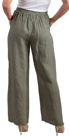 Wide-Leg Linen Pant with Front Pockets. Features a Stretchy Elastic Waistband that Ties at the Front. 100% Linen Model is 5'7 One Size Made in Italy Stretch Linen Bottoms With Pockets, Stretch Linen Trousers, Stretch Linen Pants With Elastic Waistband, Stretch Linen Wide Leg Bottoms, Stretch Linen Pants For Loungewear, Full Length Linen Bottoms For Loungewear, Stretch Linen Wide-leg Pants, Linen Wide-leg Pants With Welt Pockets, Wide-leg Linen Pants With Patch Pockets