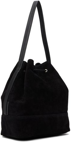 Lightweight suede shoulder bag in black. · Fixed shoulder strap · Drawstring closure · Patch pocket at interior · Canvas lining · H11 x W14.5 x D6 Supplier color: Black Chic Suede Bucket Bag With Removable Pouch, Chic Suede Bucket Bag With Suede Lining, Formal Suede Shoulder Bag With Suede Lining, Evening Suede Bags With Leather Handles, Modern Suede Shoulder Bag For Evening, Black Suede Bag With Detachable Strap, Chic Suede Bucket Bag For Travel, Luxury Suede Bucket Bag, Formal Suede Shoulder Bag With Detachable Strap