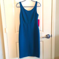 Nwt Betsey Johnson Teal Midi Dress Size 4 Snaps For Holding Bra Straps In Place! Tag Says The Color Is Teal And It Is Absolutely Gorgeous! Very Versatile! Office, Party, Date Night, Oh My! Polyester And Spandex (Has Some Stretch!) I Bought This When I Was A Size 6 And It Fit. Sadly It No Longer Fits Me As I Am A 8/10 Now Approx Measurements (Flat) Pit To Pit 16.5" Waist Seam About 14" Length From Waist Seam To Bottom 26" Length From Strap To Bottom Almost 40" Sleeveless Blue Workwear Dress, Blue Sleeveless Dress For Work, Blue Sleeveless Workwear Dress, Blue Lined Sleeveless Dress For Party, Teal Midi Dress, Evening Midi Dress, Cotton Corset, Betsey Johnson Dress, Red Sleeveless Dress