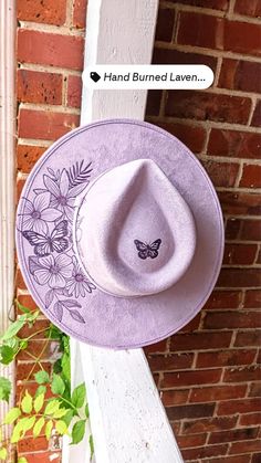 burned by hand, color of the hat is lavender, or light purple. the design is butterflies and flowers Burning Flowers, Cowboy Hats Women, Hat Burning, Western Style Wedding, Custom Made Hats, Lavender Butterfly