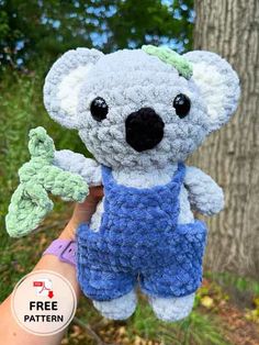 a crocheted koala bear holding onto a tree branch with the caption free pattern