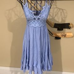 Light Blue Summer Dress. Can Be Worn Casual Or Somewhat Dressy. Perfect For Summer Day Or Night. Purchased At A Boutique In New Smyrna Did Not Fit. This Style Is Similar To The Free People Spaghetti Strap Dress Blue Lace Trim Dress For Spring, Light Blue Flowy Mini Dress For Date Night, Vacation Blue Dresses With Lace Trim, Light Blue Summer Dress For Date Night, Blue Midi Sundress For Date Night, Blue Midi Length Sundress For Date Night, Flowy Light Blue Mini Dress For Date Night, Blue Lace Trim Dress For Vacation, Blue Midi Dress With Lace Trim For Brunch