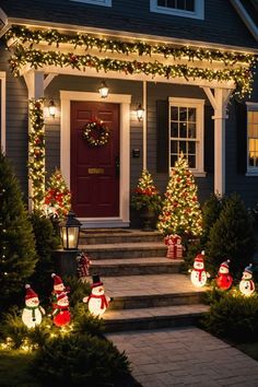 christmas decorations on the front steps of a house