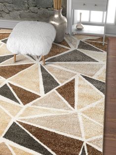 an area rug with various colors and shapes