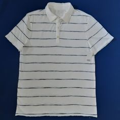 This Is A Good Lightweight, Short-Sleeved Summer Tee With 3-Button Neckline..New, Never Worn..White With Navy Stripe Front And Back..100% Cotton..Machine Wash..Large Size..Length 29", Chest 42", Neck 17". Casual Striped Collared Tops, Fitted Striped Collared T-shirt, Striped Relaxed Fit Casual Tops, Casual Striped Relaxed Fit Tops, Casual Striped Tops With Relaxed Fit, Casual Striped Fitted Tops, Fitted Striped Collared Tops, Tan Cotton Shirt For Summer, Casual White Collared T-shirt