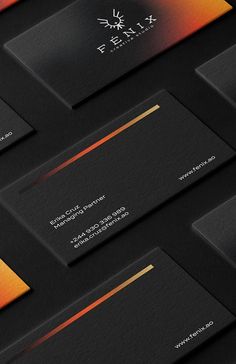 black and orange business cards with gold accents