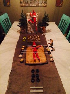 the table is set up for a party with decorations