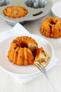 a bundt cake on a plate with a fork