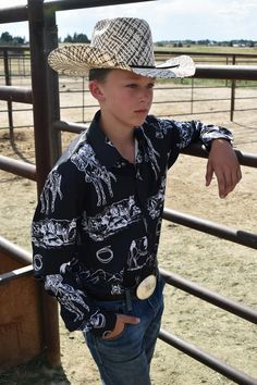 Our custom designed arena shirts are absolutely stunning and you won't find them anywhere else! Boast some serious style in this Unisex Western Button Up Shirt . Be rodeo-ready! Made from 100% polyester, lightweight and comfortable. Fabric has a slight sheen. This classic shirt provides a button-up style with long sleeves and chest pocket. Two buttons are included on each sleeve cuff to adjust a comfortable fit. PLEASE ALLOW UP TO 14 BUSINESS DAYS TO RECEIVE YOUR ORDER. Please calculate your siz Black Long Sleeve Tops For Western-themed Events, Western Black Shirt For Ranch, Western Style Black Shirt For Ranch, Black Western-style Shirt For Western-themed Events, Black Casual Shirt For Rodeo, Casual Black Shirt For Rodeo, Ranch Life, Timor Leste, Sleeve Cuff