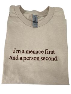 I am a menace first and a person second-gender neutral tee. This lovely embroidered shirt is perfect for the lovely in your life who wants all the world to know who they really are. Available in 100% cotton tee or 50/50 cotton/poly blend crewneck sweatshirt-choose from so many colors!  NOTES:  -Standard Processing time is between 1-5 Business Days (We work our butts off to get our orders out sooner than this. During the holidays expect slight delays as we are busier than ever, but know that we are working around the clock to make sure your order gets to you ASAP.   -Our Free Shipping uses USPS First Class mail which takes 1-5 business days to be delivered. -Upgrade to Priority shipping (for an extra fee) and receive your package in 2-3 business days. -IN A HURRY? Purchase our RUSH listing Etsy Graphic Tees, Shirts That Go Hard, Embroidered Clothes Ideas, Shirts With Words, Tee Shirt Ideas, Sweatshirts Ideas, Cool Clothing, Funky Shirts