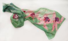 Hand painted silk scarf. Orchids silk scarf shawl. Large green scarf with light pink orchids. Spring scarves.Silk painting. MOthers Day gift. Floral scarves painted by hand. size is 17 by 70 inches 45 by 180 cm scarf painted on pure silk, ponge 6 Wash only by hand in cold water. All scarves in my shop are painted by hand only!!There's not any prints. MADE TO ORDER Silk scarves by me; http://www.etsy.com/shop/klaradar?section_id=6054911 Each and every purchased scarf is carefully gift wrapped. © Green Scarf As Spring Gift, Green Scarf For Spring Gift, Green Scarves For Spring Gift, Green Floral Print Scarf For Gift, Green Floral Print Scarves As Gift, Mothers Day Gif, Silk Scarf Painting, Hand Painted Silk Scarf, Pink Orchids