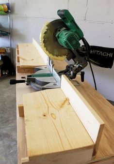 a table saw is being used to cut wood