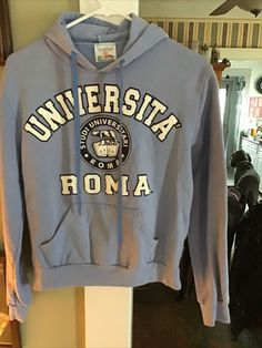 Universita Roma sweatshirt lt. blue small made in Italy. 19” pit to pit 22 sleeve length Light Blue Letter Print Sweatshirt For Fall, Blue Hoodie Sweatshirt With Logo Print, Casual Light Blue Sweatshirt With Letter Print, Light Blue Hooded Sweatshirt With Letter Print, Blue College Hoodie Sweatshirt, In Italy, Sleeve Length, Italy, Sweatshirts