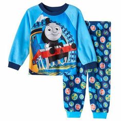 THOMAS THE TANK ENGINE **2 PIECE LONG SLEEVE PAJAMA SET** **SIZE 3T** This listing is for one brand new Thomas the Tank Engine 2 piece pajama set.   This is so cute in a beautiful 'Thomas Blue' with pictures of Thomas on the top and train symbols all over the bottoms!  This is great for all seasons as they are 100% polyester, so soft and flame resistant.  Brand New with Tags....an awesome gift to keep your little engineer warm and cozy all year round!! CHECK OUT MY OTHER AUCTIONS AND EBAY STORE Clubbing Shoes, Pajamas Robe, Toddler Top, Plus Size Sleepwear, Thomas The Tank, Altering Clothes, Thomas The Tank Engine, Engine 2, Fleece Pajamas