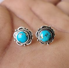 925 Sterling Silver Blue Turquoise Flower Stud Earrings 8mm Diameter Gift Boxed, Lovely Blue Turquoise Stud Earring, Handmade Stud Earring Description Metal :- 925 Sterling Silver Style : Stud Earring Gemstone:- Blue Turquoise Benefits Of Blue Turquoise Turquoise has a strong connection to the throat chakra and helps to enhance communication and expression. It also aligns all of the chakras and is often used for healing purposes. Turquoise can also help you become more open to love and forgivene Nickel-free Blue Sterling Silver Flower Earrings, Blue Sterling Silver Flower Earrings Nickel Free, Turquoise Flower Earrings Gift, Blue Sterling Silver Flower Earrings For Pierced Ears, Blue Round Flower Earrings In Sterling Silver, Adjustable Turquoise Flower Earrings Gift, Blue Silver Earrings For Anniversary, Blue Anniversary Earrings Stamped 925, Blue Round Flower Earrings Hypoallergenic