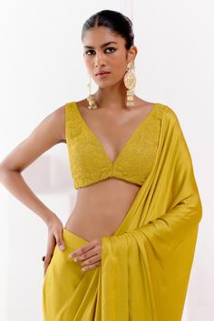 Mustard pre-draped satin saree with asymmetric hem. Comes with a  dori embroidered cotton silk satin blouse. - Aza Fashions Elegant V-neck Blouse For Festive Occasions, Elegant Festive V-neck Blouse, Festive V-neck Evening Blouse, Elegant V-neck Sets With Padded Blouse, Draped Choli For Formal Occasions, Formal Draped Choli, Elegant V-neck Choli For Party, Elegant Yellow Blouse For Evening, Festive V-neck Blouse For Evening