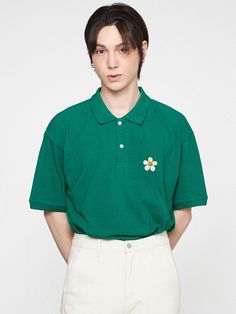 Editor's NotesThis essential polo shirt is simply accented with a dense embroidery of signature flower motif and easily goes with any bottoms. It's cut from soft touch cotton and poly-blend pique.- Polo collar- Half placket with button fastenings- Graphic embroidery on the chest- Drop shoulder- Short sleeves- Relaxed fit- Unisex wear- Minimize distortion after washingMeasurements (in.)S / M / L- Total Length: 28.0 in. / 29.5 in. / 31.1 in.- Shoulder: 19.3 in. / 20.5 in. / 21.3 in.- Chest: 20.9 in. / 22.0 in. / 22.8 in.- Sleeve Length: 8.3 in. / 8.7 in. / 9.1 in.Model Info:- Man: 5' 10.1, 143.3 lbs / Fitting size L- Woman: 5' 5, 112.4 lbs / Fitting size SComposition & Care- 80% Cotton, 20% Polyester (20's)- Recommend separate wash at low temperature water using neutral detergent or dry Green Cotton Polo Shirt With Collared Neckline, Green Collared Cotton Polo Shirt, Green Cotton Collared Polo Shirt, Spring Cotton Polo Shirt With Collared Neckline, Spring Cotton T-shirt With Collared Neckline, Green Relaxed Fit Polo Shirt, Green Casual Polo Shirt For Spring, Spring Polo Collar T-shirt, Casual Embroidered Cotton Polo Shirt