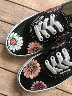 Perfect for the flower-loving toddler in your life! Both shoes have different colored flowers scattered around the shoe. All artwork is hand-painted by me using acrylic paint with a fabric medium. The photographs above are Youth Authentic Vans in the color Black in size 1. This floral design can be created on any size Vans. Please specify the size and color in your order. Every pair is custom for you and each pair is made to order. It takes about three weeks(sometimes quicker!) until the shoes a Hand Painted Vans, Shoe Artwork, Vans Custom, Painted Shoes Diy, Floral Vans, Painted Vans, Custom Painted Shoes, Custom Shoes Diy, Tenis Vans