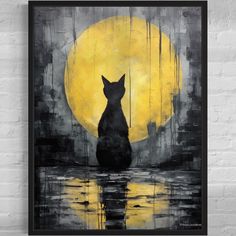 a black cat sitting in front of a yellow moon