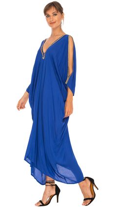 Feeling sexy has never been so easy. Simply toss on this long kaftan dress and wear out for many occasions. Don't forget to pack it on your next beach vacation. It is lightweight with cold shoulder sleeves. Delicate hand sewed gold beading along the deep V neckline. Get your flirt on! Semi-sheer Hand Sewed gold beading Made from lightweight rayon Hand wash cold, hang to dry Embellished V-neck Maxi Dress For Beach, Embellished V-neck Kaftan For The Beach, Blue V-neck Kaftan For Party, Elegant V-neck Festival Kaftan, Blue Embellished V-neck Kaftan, Bohemian Embellished Maxi Length Thobe, Bohemian V-neck Abaya For Party, Bohemian V-neck Party Abaya, Summer Beach V-neck Abaya