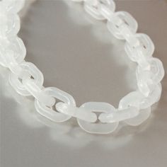 a close up of a bracelet on a table